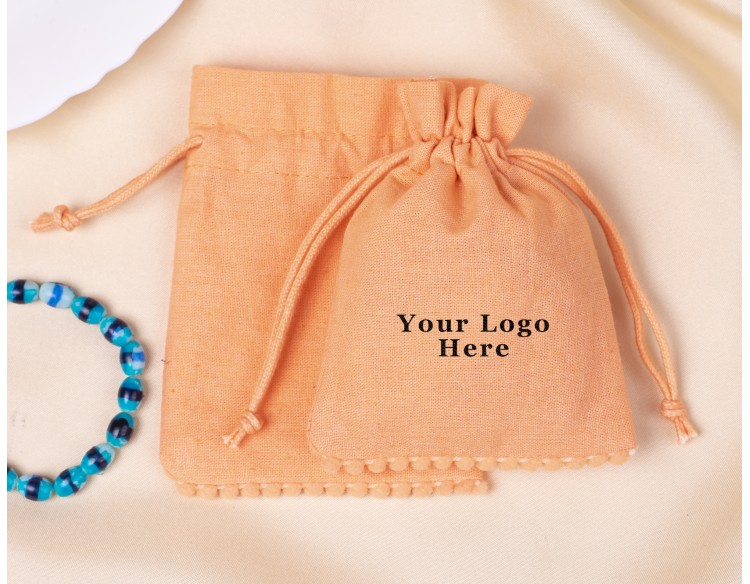  100 Light Orange Bottom PomPom Cotton Drawstring Pouches For Jewelry Packaging With Brand Logo Print 