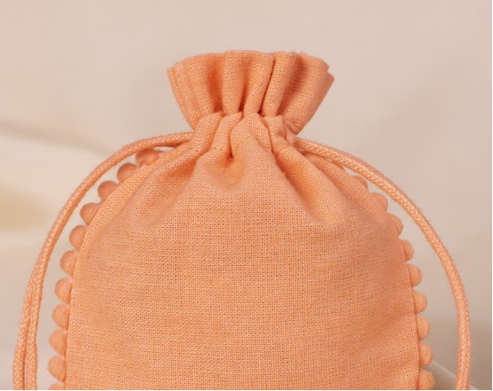 100 Light Orange Round PomPom Cotton Drawstring Pouches For Jewelry Packaging With Brand Logo Print, Designer Borders